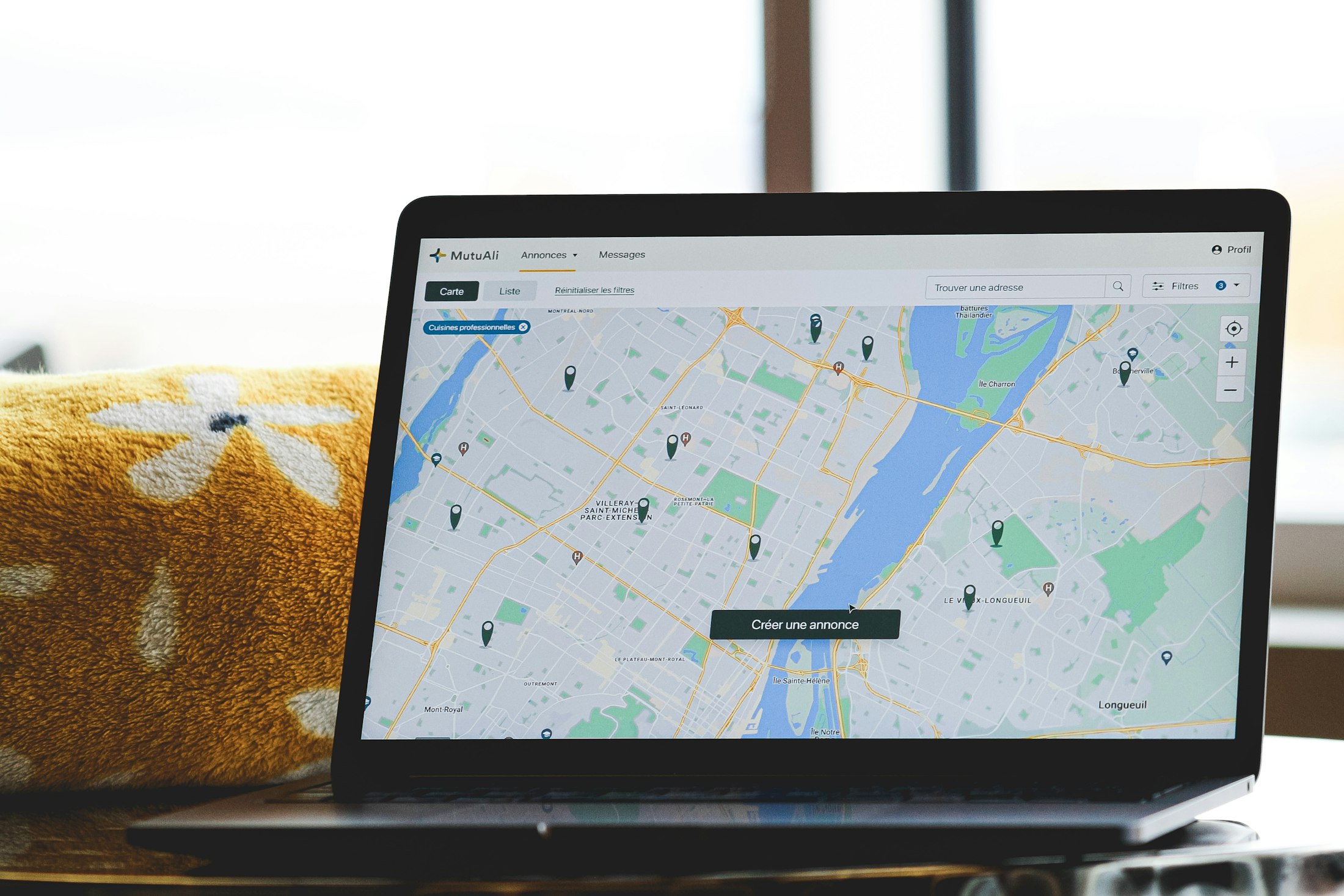 Laptop displaying a digital map while researching local business listings
