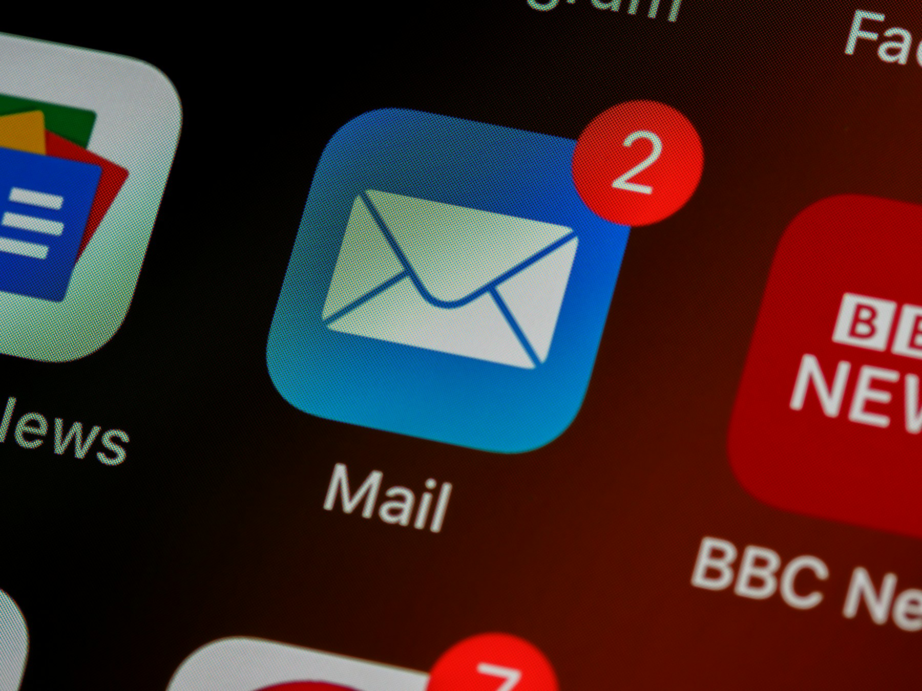 Close-up of an email app icon on a smartphone