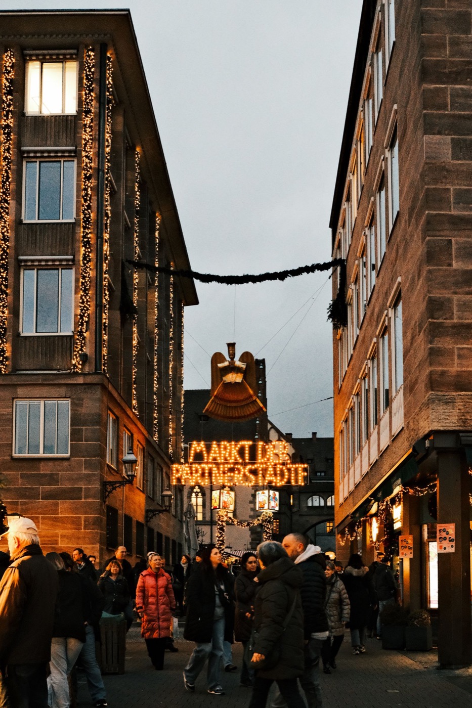 A festive Christmas market illuminated in the evening