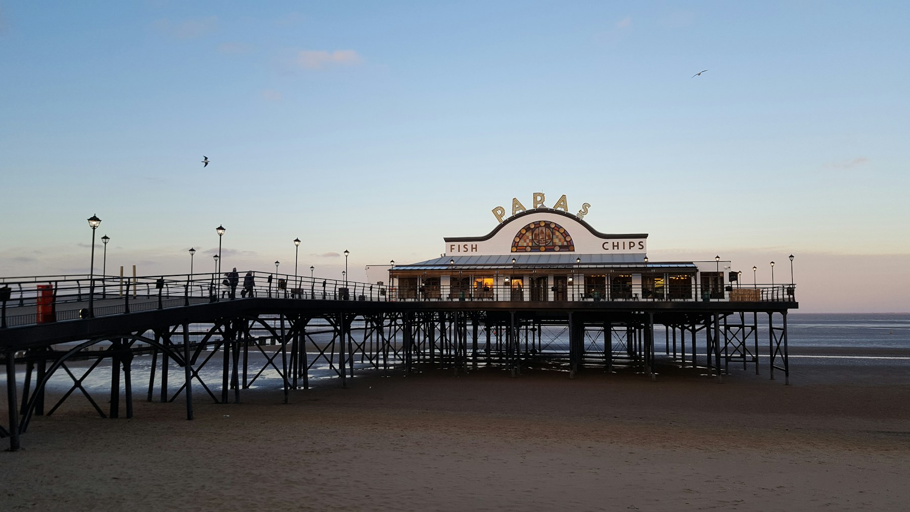 Paras Fish and Chips on Cleethorpes Pier at dusk