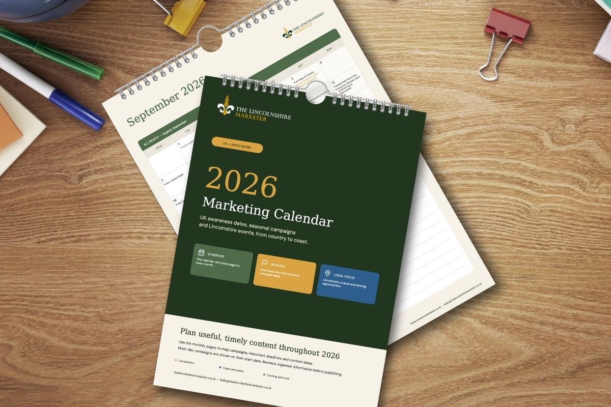 Printed Lincolnshire Marketer 2026 Marketing Calendar displayed on a wooden desk