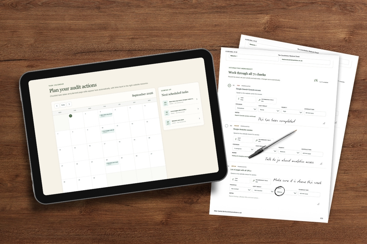 Tablet displaying the marketing audit action calendar beside a printed interactive audit worksheet